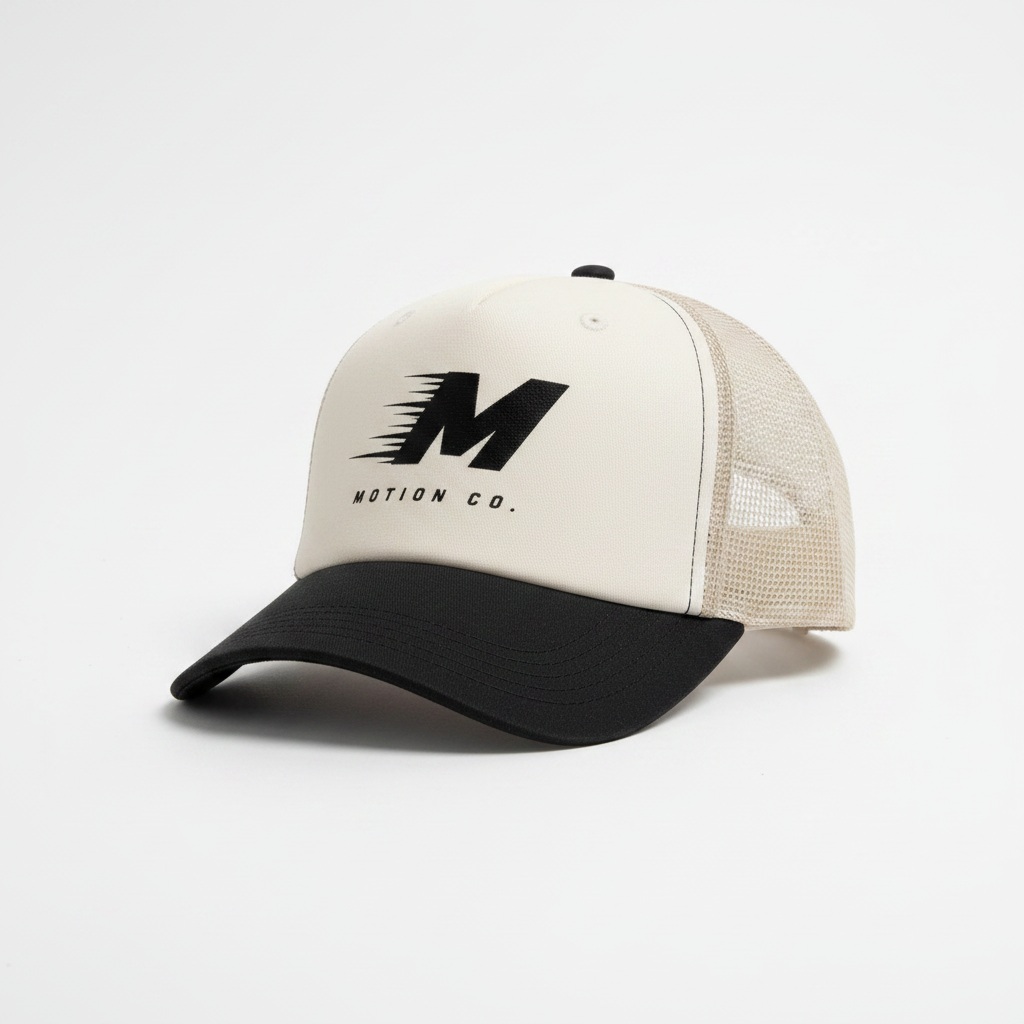 Motion Co. Trucker Hat in Black and Cream