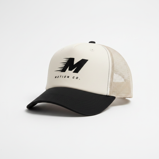 Motion Co. Trucker Hat in Black and Cream